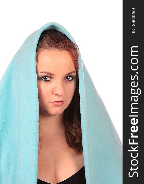 Model covering her head with a blue blanket