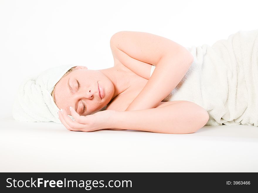 Studio portrait of a spa girl sleeping. Studio portrait of a spa girl sleeping