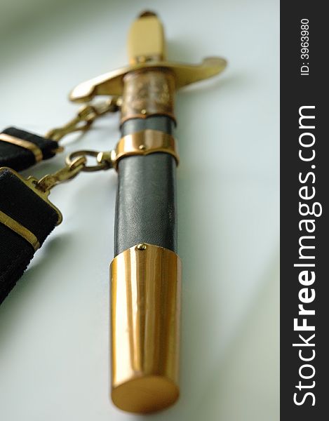Old dirk of Russian navy officer. Close-up photo. Old dirk of Russian navy officer. Close-up photo.
