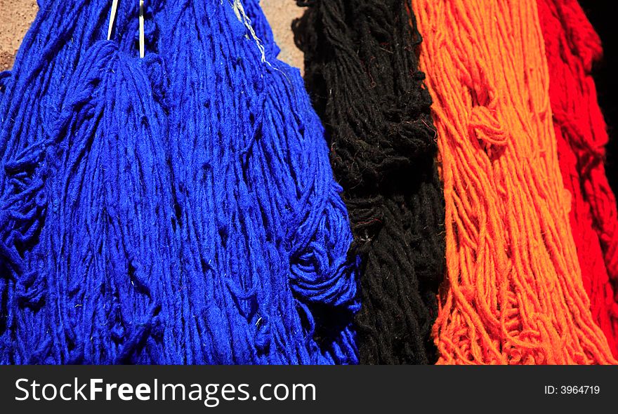 Coloured wool drying in the sun Marrakech Morocco