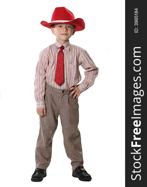 The cheerful boy in a cowboy's hat and a tie