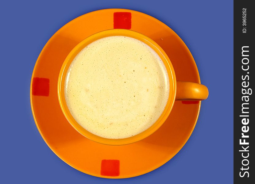 Black coffee in the orange cup. blue backgrounds
