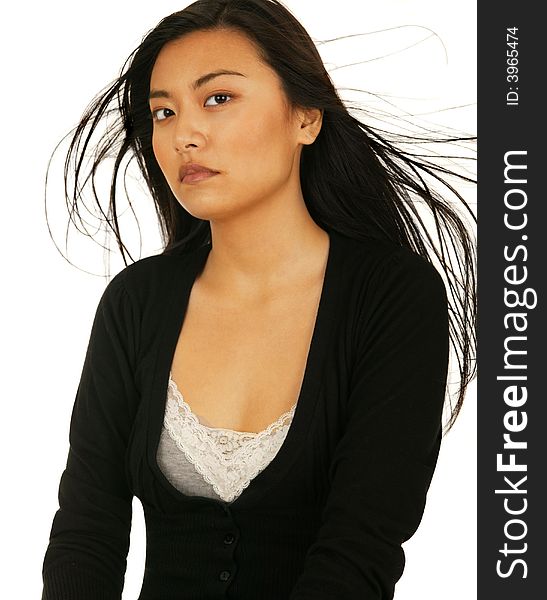 Beauty portrait of asian girl with fly away hair. Beauty portrait of asian girl with fly away hair