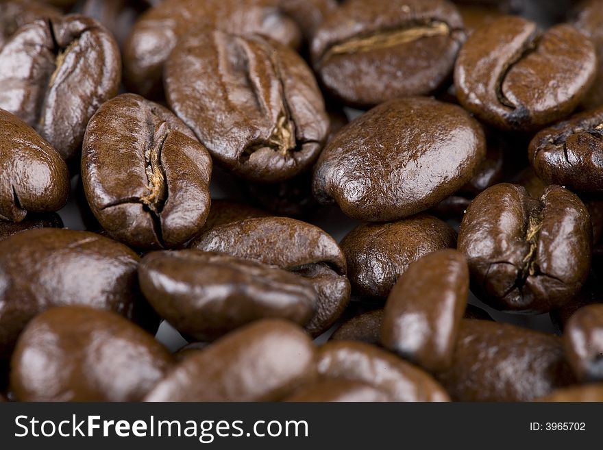 Close-up macro shot of coffee beans. Close-up macro shot of coffee beans