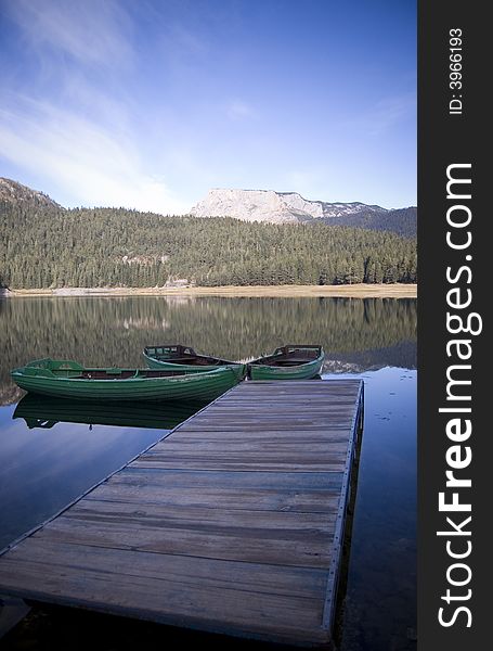 Three Boats on the lake dock