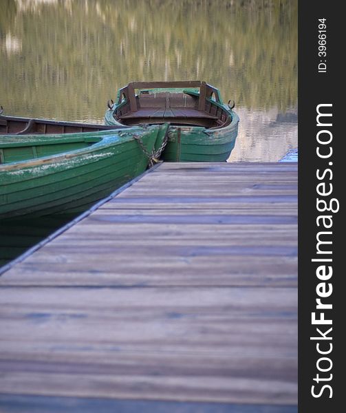 Two boats on the lake dock