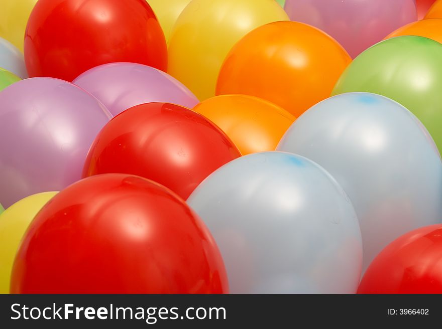 Many different bright colored ballons. Many different bright colored ballons