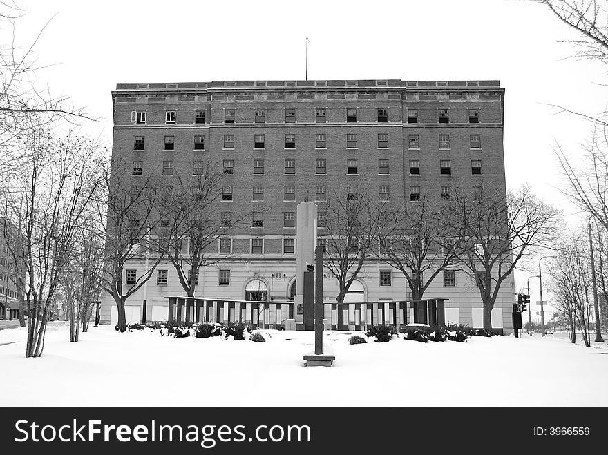 An old abandoned hotel in black and white.