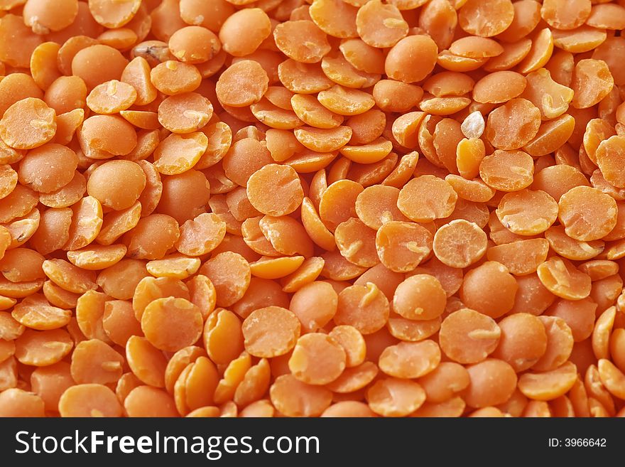 Close up of orange/red lentil seeds. Close up of orange/red lentil seeds.