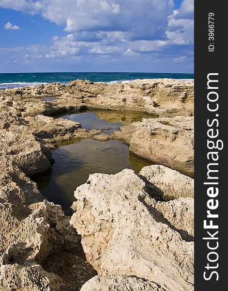 Sea water gathered in small rocky pools. Sea water gathered in small rocky pools.