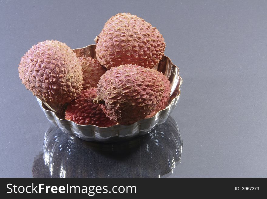 Some litchis isolated on a background
