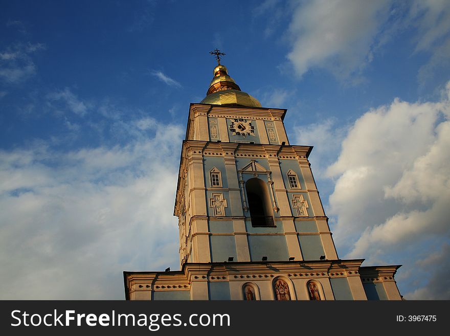 This is a photo of the bell tower of Michailovsky cathedral (Kiev). The photo was made at sunset. This is a photo of the bell tower of Michailovsky cathedral (Kiev). The photo was made at sunset.