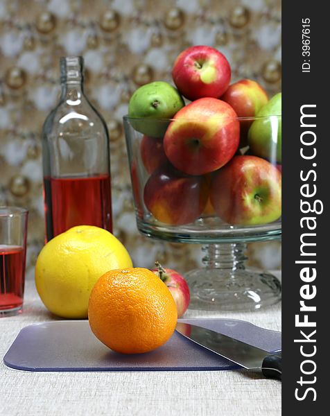 Fresh organic apples, oranges and pears on a kitchen table. Fresh organic apples, oranges and pears on a kitchen table