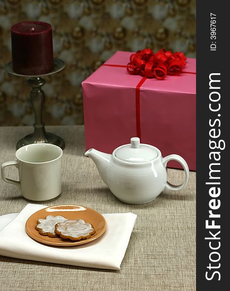 A party table set with cookies and tea