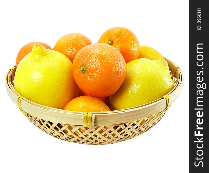Mandarines and lemons in the bucket