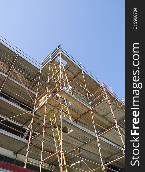 Scaffold on new building shot from below