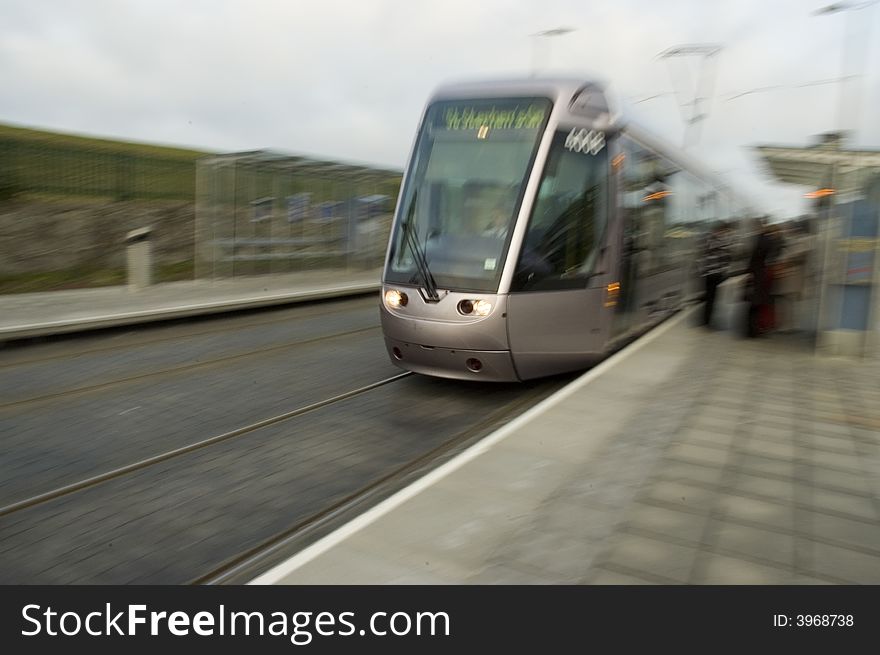 Laus Tram travelling at high speed in Dublin