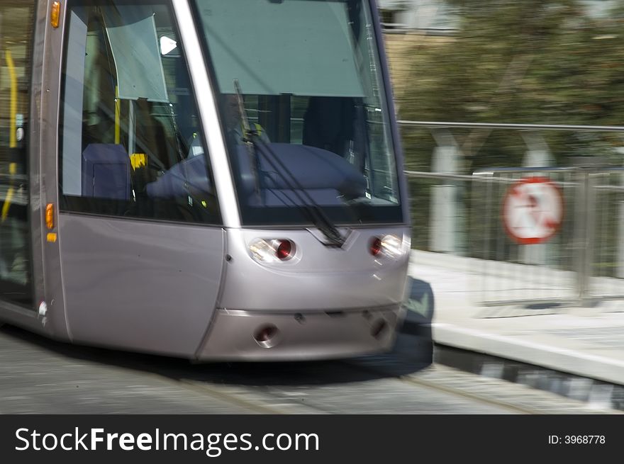 Laus Tram travelling at high speed in Dublin