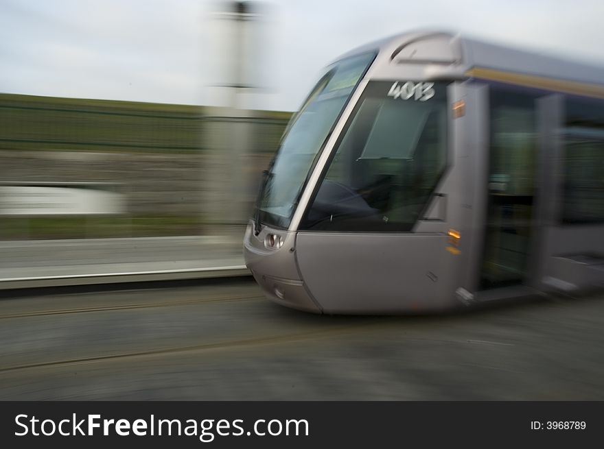 Laus Tram travelling at high speed in Dublin