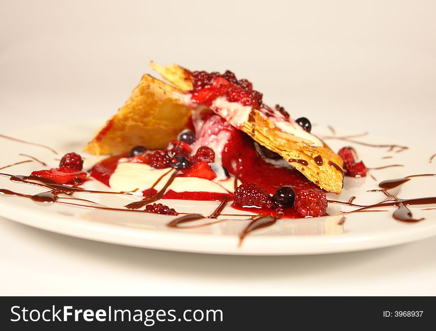 Dessert with berry and icecream and fluffy dough. Dessert with berry and icecream and fluffy dough