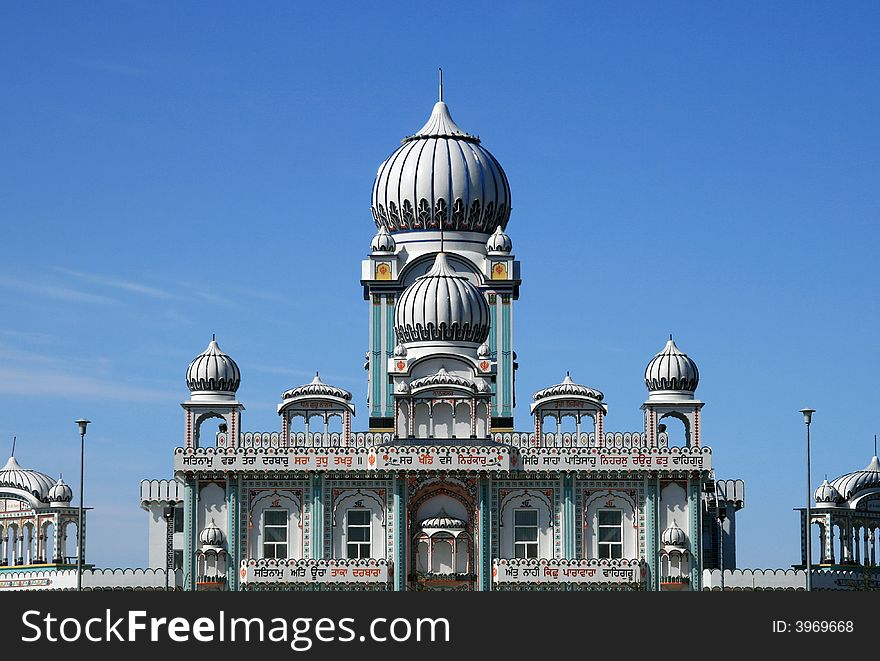 Architectural detail of some domes on a very colorful mosque. Architectural detail of some domes on a very colorful mosque