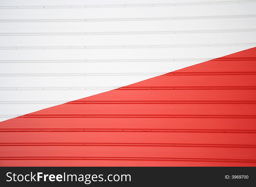 Abstract detail of the colorful exterior of a metal sided sports building. Abstract detail of the colorful exterior of a metal sided sports building