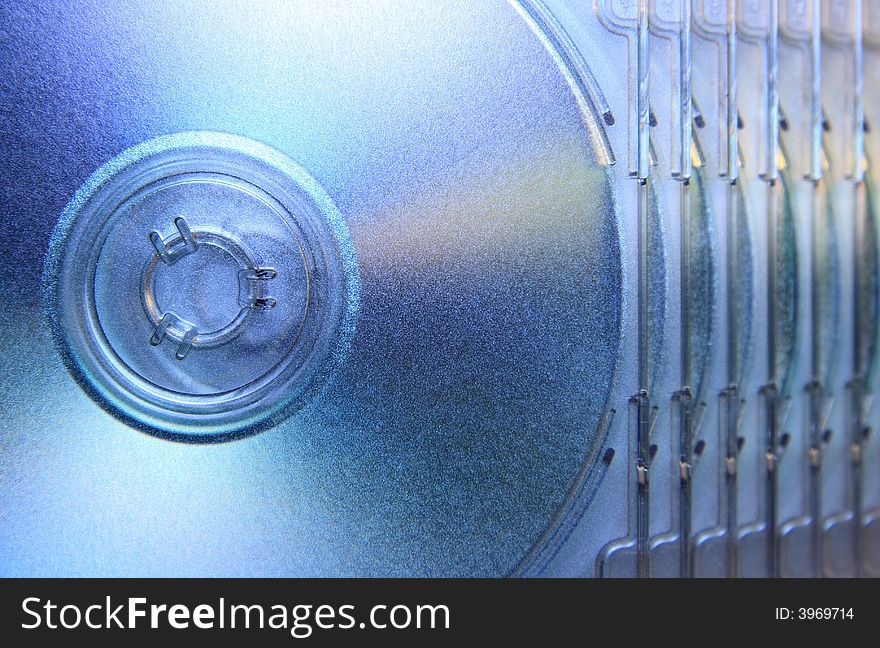 Close up abstract of a pile of fanned out compact discs. Close up abstract of a pile of fanned out compact discs