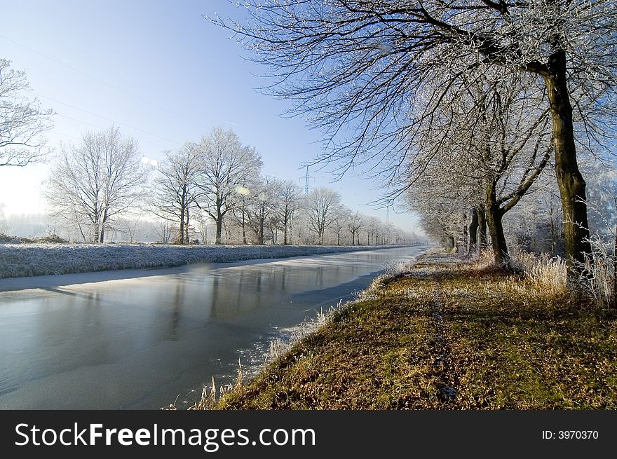 Winter water landscape with blue sky. Winter water landscape with blue sky