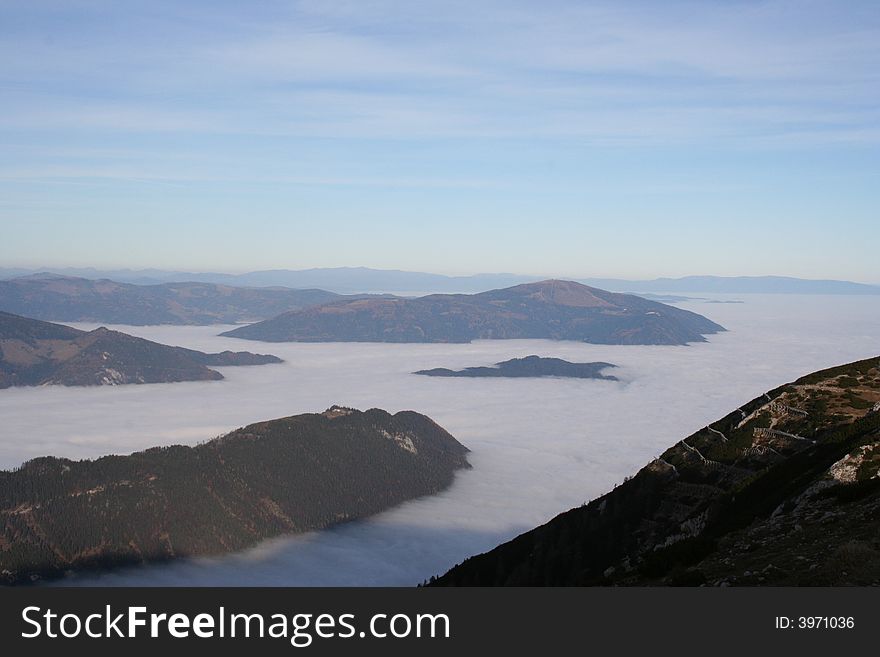 On the summit of dobratsch in Villach Austria during inversion weather (down it is cold, on the mountain quite nice). On the summit of dobratsch in Villach Austria during inversion weather (down it is cold, on the mountain quite nice)