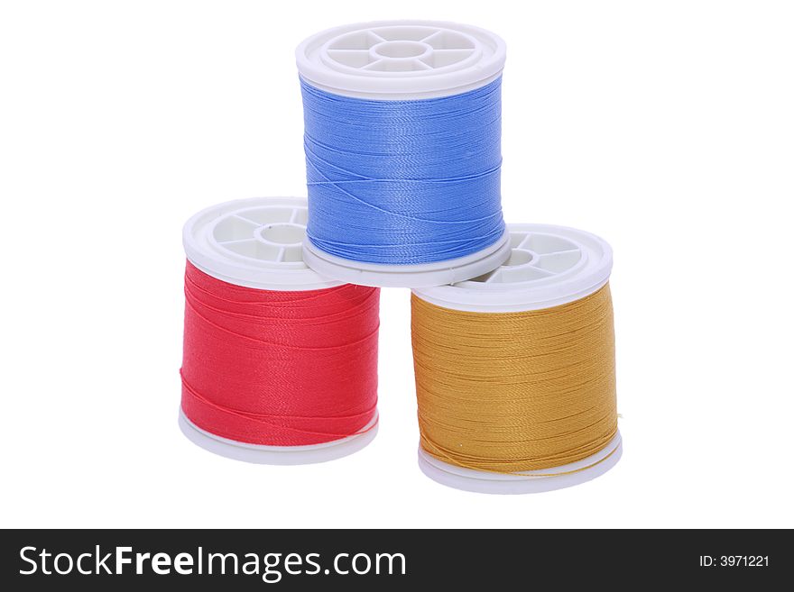 Thread reels isolated on white. Thread reels isolated on white