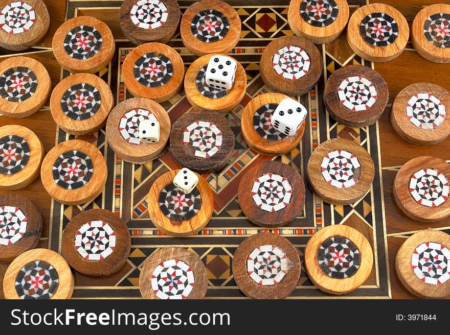 Handmade backgammon and playing dice.