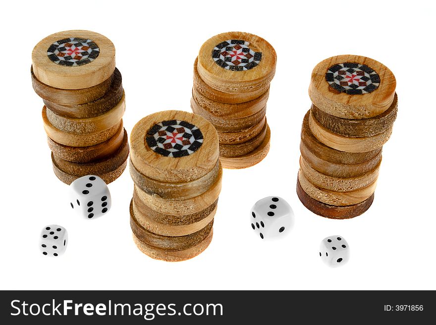 Handmade backgammon chips and playing dice.