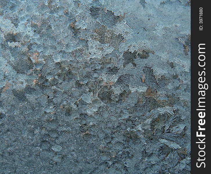 Ice patterns on frosty window. Ice patterns on frosty window.