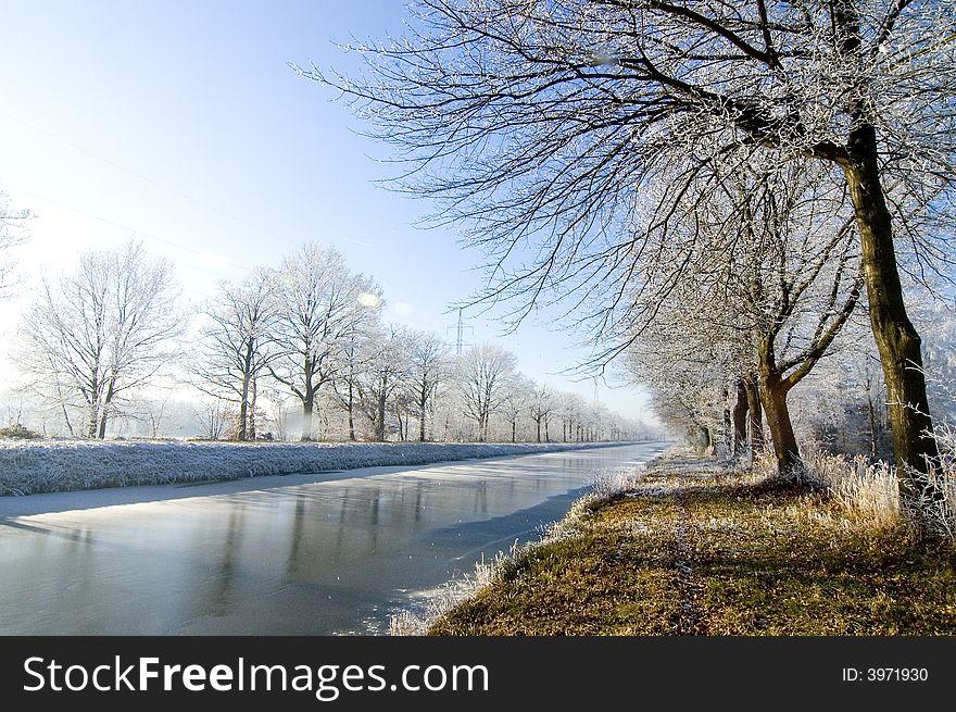 Winter water landscape with blue sky. Winter water landscape with blue sky