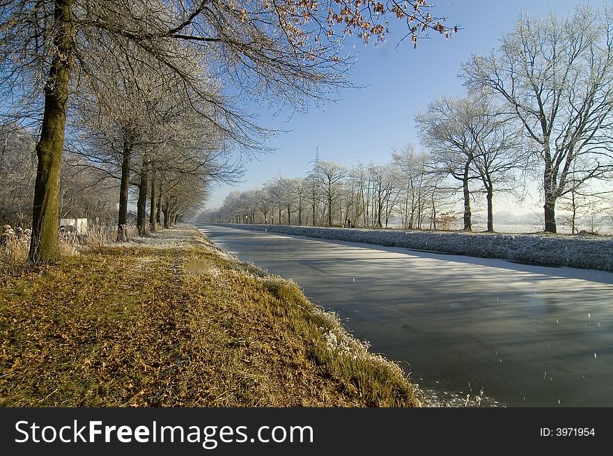 Winter water landscape with blue sky. Winter water landscape with blue sky