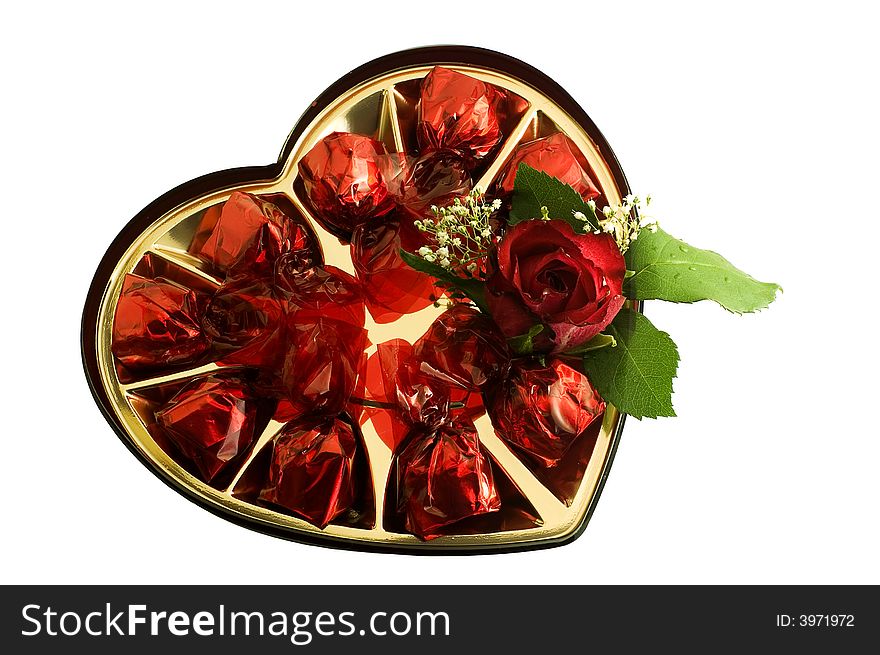Candies with a nice red rose  isolated on white background