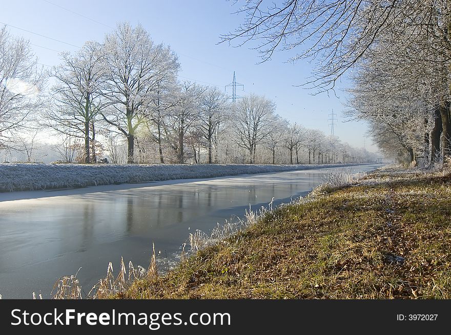 Winder wonderland water blue sky background. Winder wonderland water blue sky background