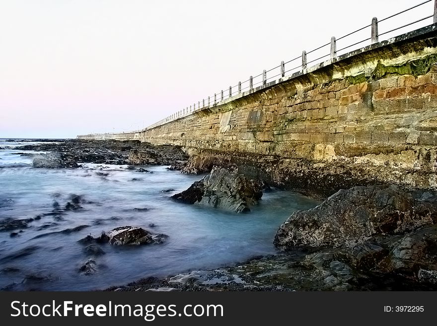 Landscape photo of an old sea-wall. Landscape photo of an old sea-wall