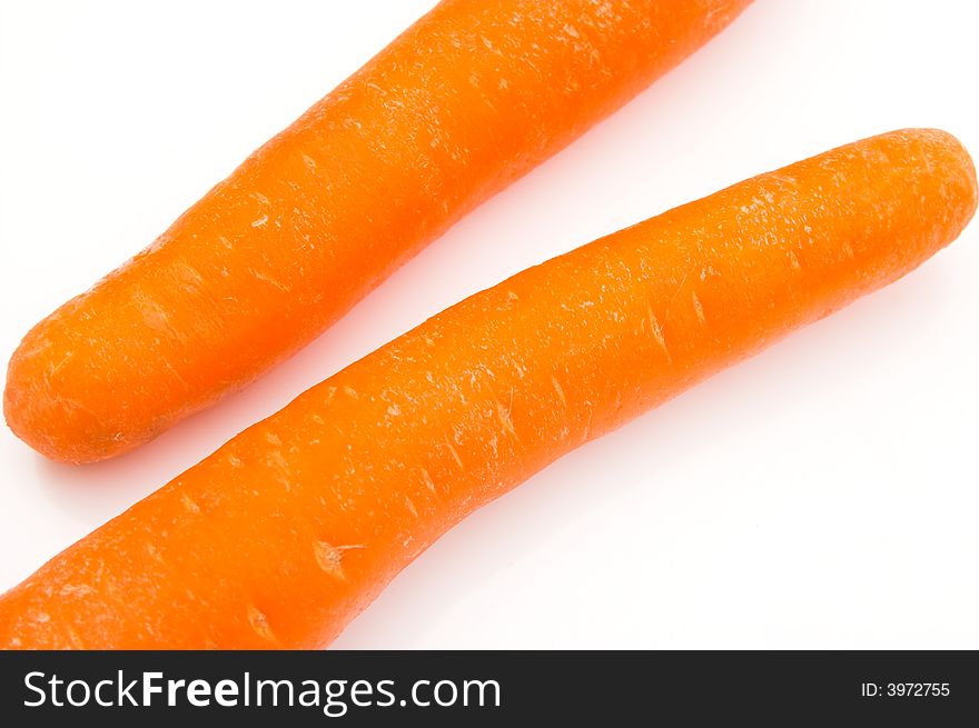 Two fresh carrots - over white background