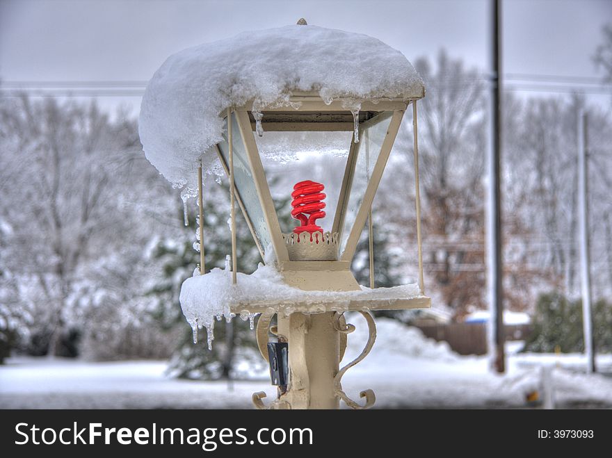 Yard lamp in the winter holiday time