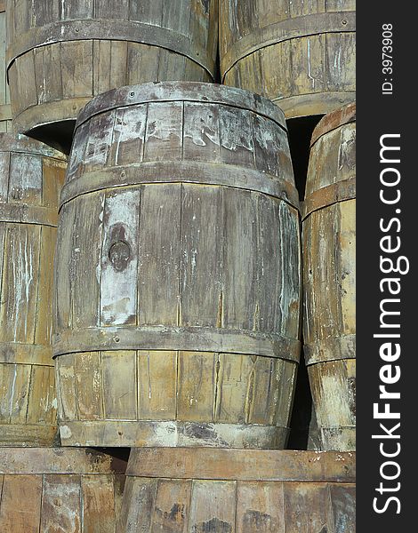 Old ship barrels texture, background. Repeated barrels. Old ship barrels texture, background. Repeated barrels.