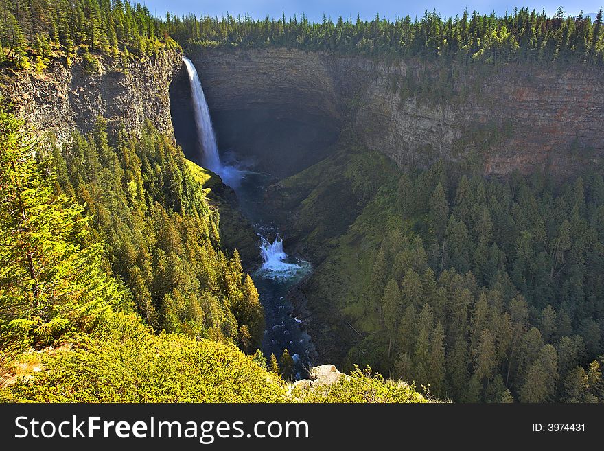 A powerful picturesque falls shined by the sun. A powerful picturesque falls shined by the sun