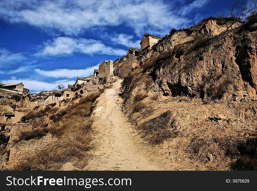 Old Village Of Loess Highland Under The Blue Sky