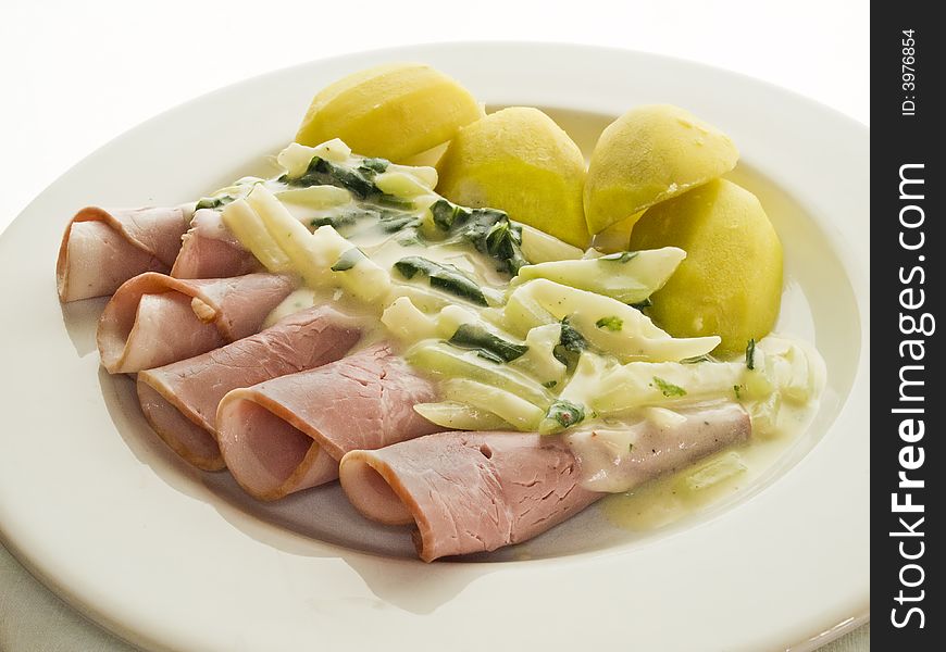 Ham rolls with potatoes and stem cabbage