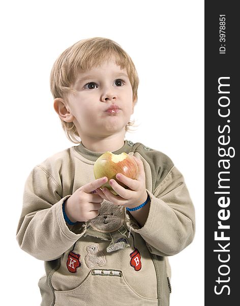 Young girl eating an apple. Young girl eating an apple