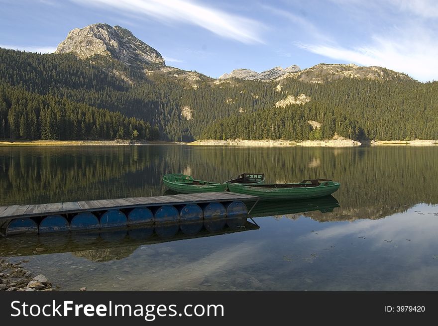 Three boats on the mountain lake