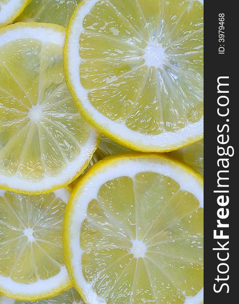 Fresh Juicy Lemon background, layers of lemon slices