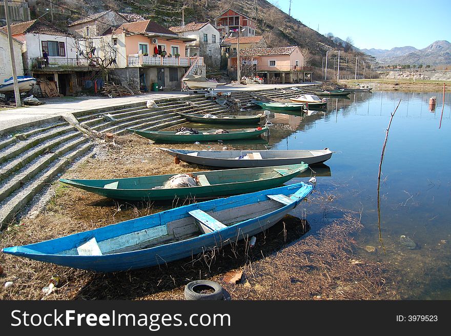 Little village with boats on the lake