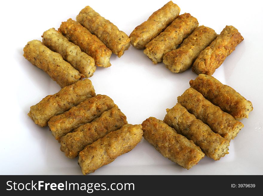 Shot of sausages isolated on white