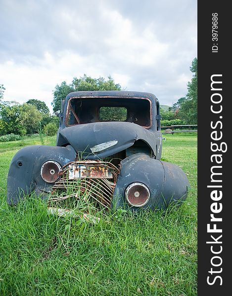 Abandoned vintage car in the fields